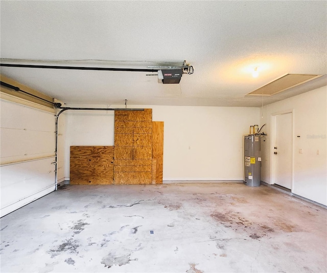 garage with electric water heater and a garage door opener