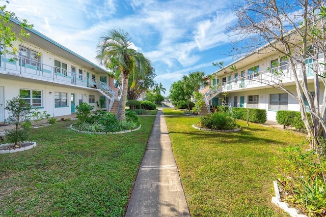 view of community featuring a lawn