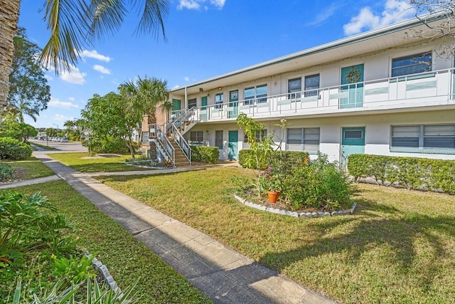 exterior space featuring a lawn