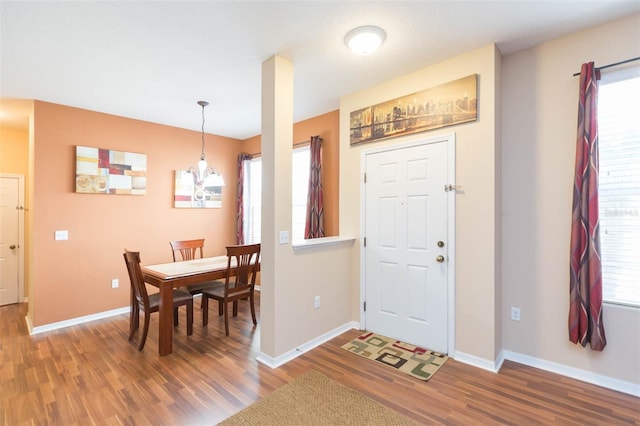 entryway with hardwood / wood-style floors