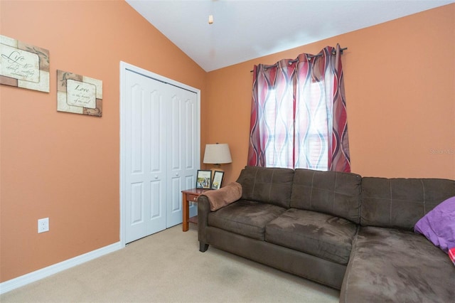 living room with light carpet and lofted ceiling