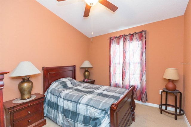 carpeted bedroom featuring ceiling fan and lofted ceiling