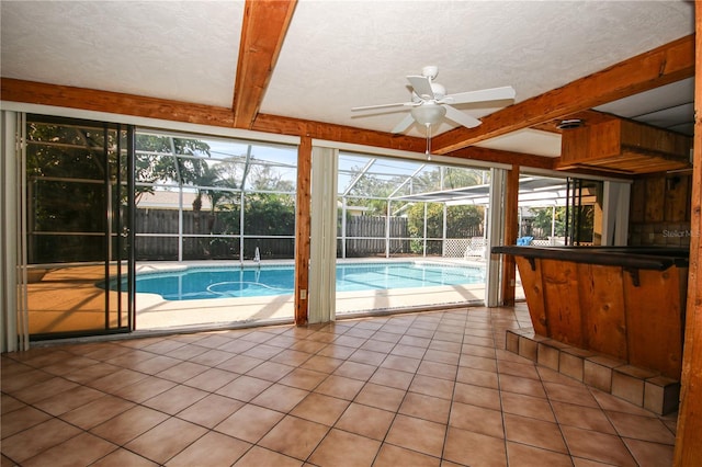 view of swimming pool with ceiling fan