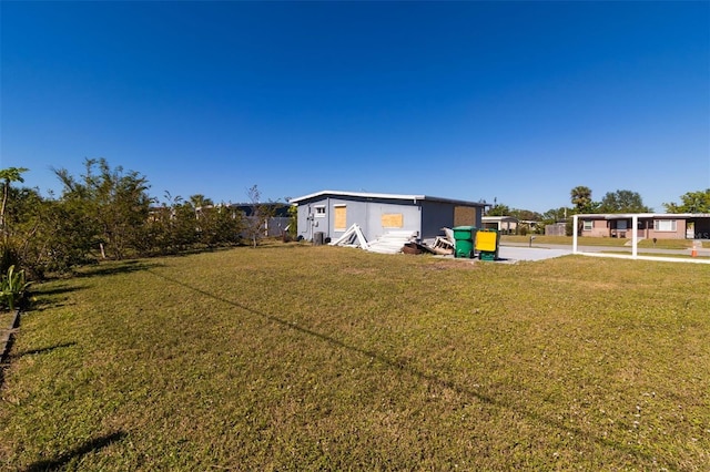 view of yard with a carport