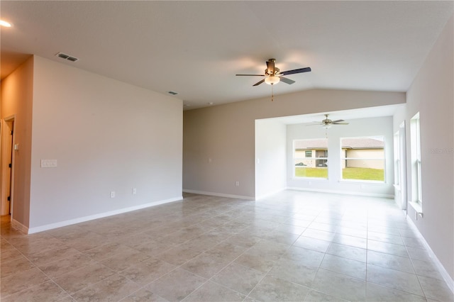 tiled spare room with ceiling fan and lofted ceiling