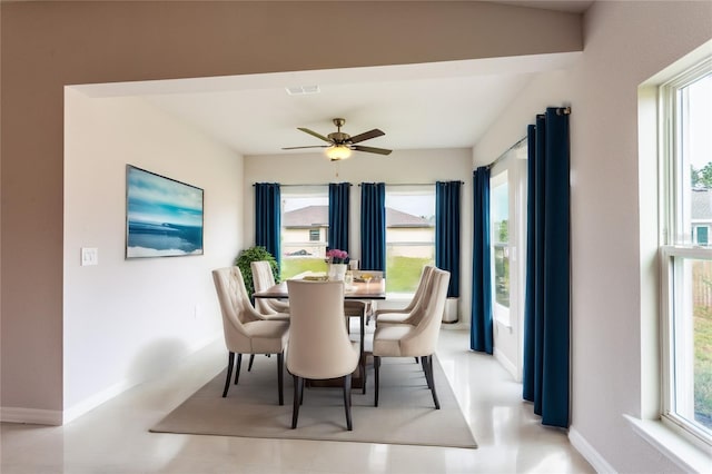 dining area with ceiling fan