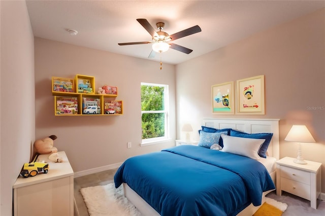 bedroom with ceiling fan and light tile patterned flooring