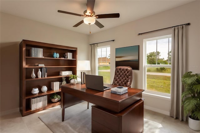 tiled office space with ceiling fan