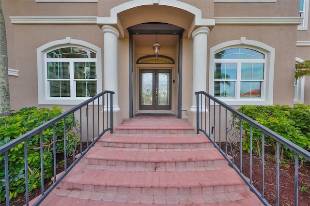 entrance to property featuring french doors