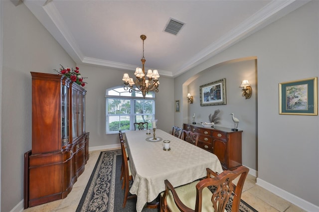 dining room with an inviting chandelier and ornamental molding