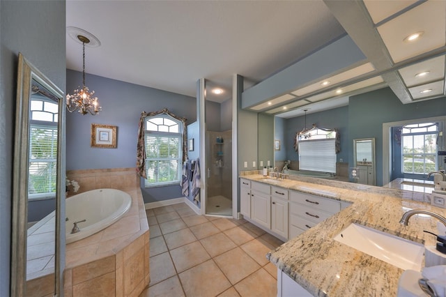 bathroom with an inviting chandelier, vanity, coffered ceiling, tile patterned floors, and independent shower and bath