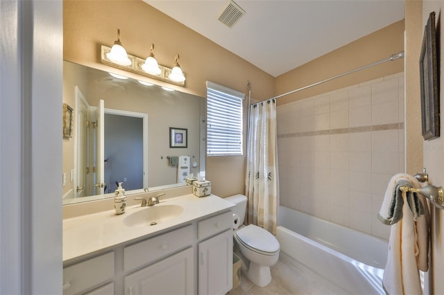 full bathroom featuring toilet, tile patterned floors, vanity, and shower / bathtub combination with curtain