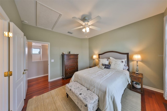 bedroom featuring ceiling fan and dark hardwood / wood-style flooring