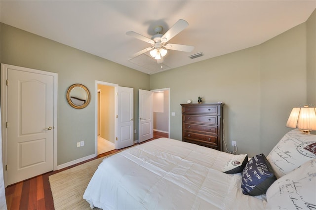 bedroom with hardwood / wood-style flooring and ceiling fan