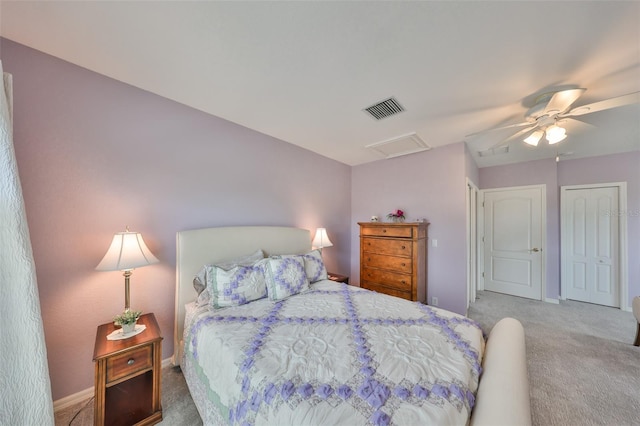 carpeted bedroom with ceiling fan