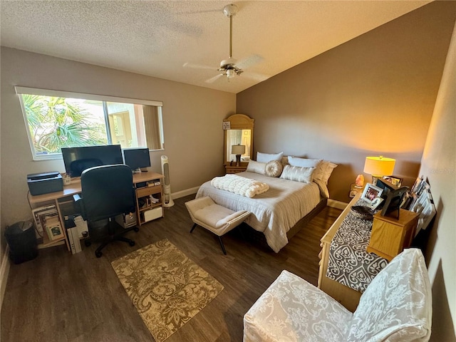 bedroom featuring vaulted ceiling, dark hardwood / wood-style floors, and a textured ceiling