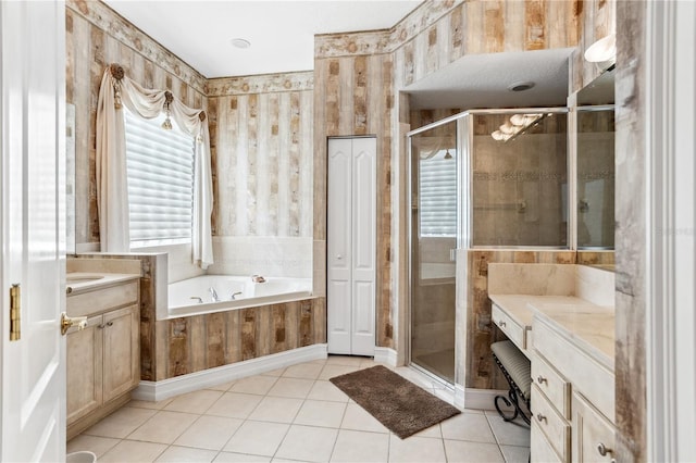 bathroom featuring vanity, tile patterned floors, and independent shower and bath