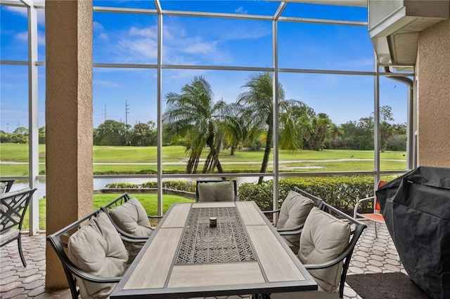 sunroom featuring plenty of natural light