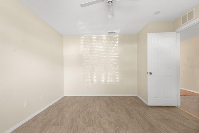 empty room with ceiling fan