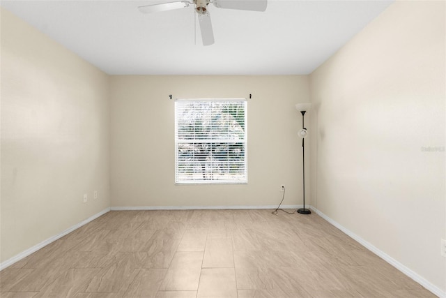 unfurnished room with ceiling fan