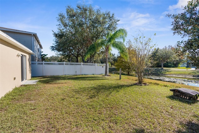 view of yard featuring a water view