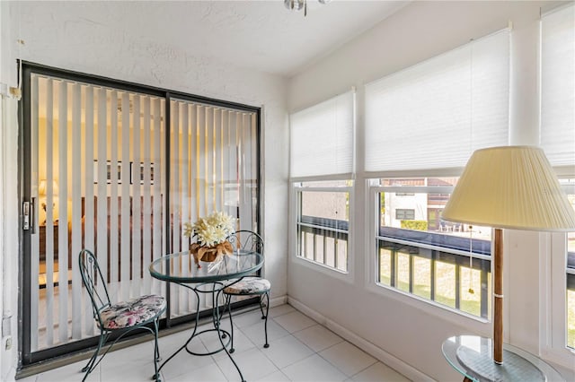 sunroom / solarium with a wealth of natural light