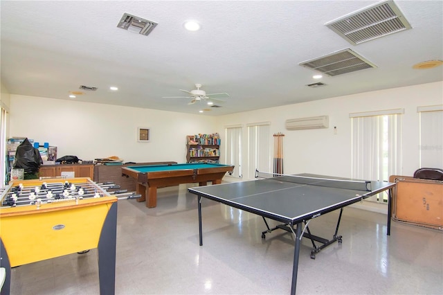 rec room featuring ceiling fan, a textured ceiling, pool table, and a wall mounted AC