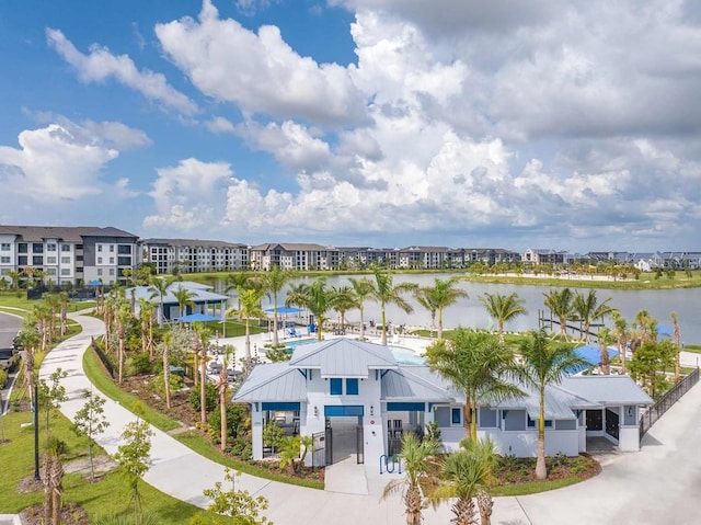 birds eye view of property featuring a water view