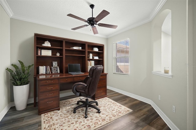 home office featuring ornamental molding, dark wood-type flooring, and a textured ceiling