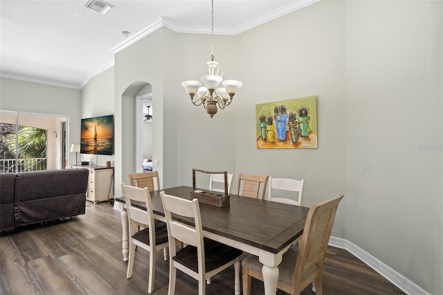 dining space with crown molding, a notable chandelier, and dark hardwood / wood-style flooring