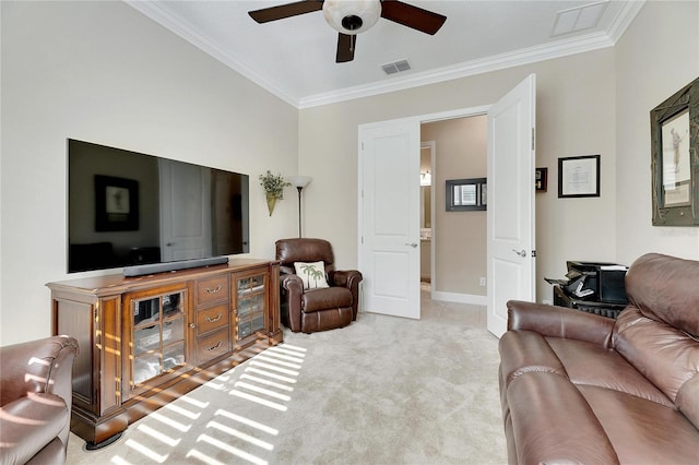 carpeted living room with ceiling fan and ornamental molding