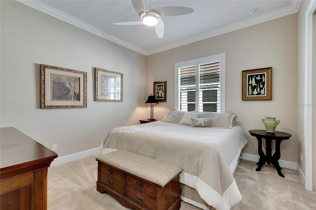 carpeted bedroom featuring ceiling fan and ornamental molding