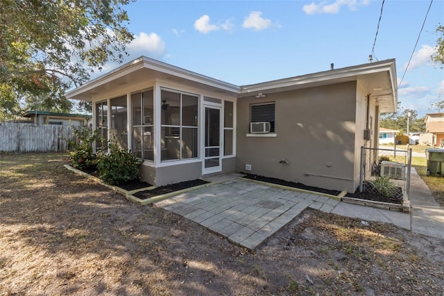 rear view of property with a patio area