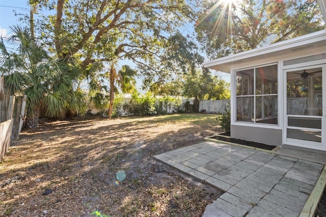 view of yard with a sunroom