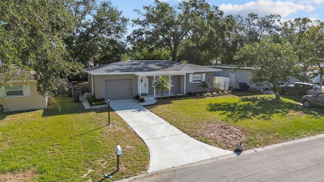 ranch-style house with a front yard and a garage