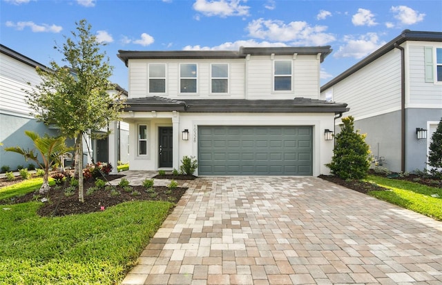 10328 Cross River Trl, Parrish, FL 34219 - traditional home featuring an attached garage and decorative driveway