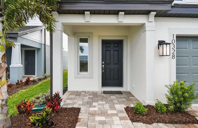 10328 Cross River Trl, Parrish, FL 34219 - view of exterior entry with stucco siding