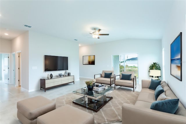 living room with ceiling fan and lofted ceiling