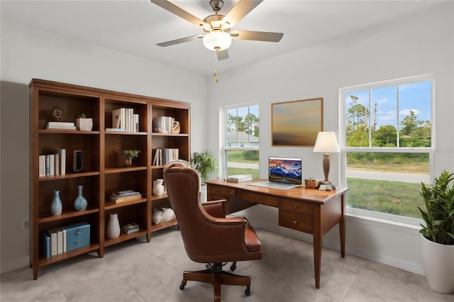 office with ceiling fan and a healthy amount of sunlight