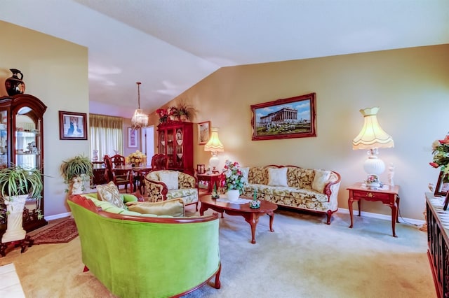 carpeted living room featuring vaulted ceiling