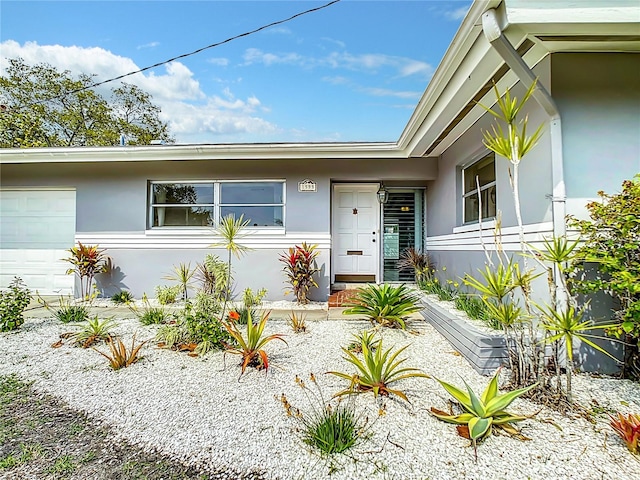 entrance to property with a garage