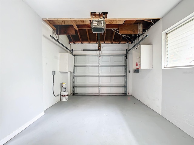 garage featuring a garage door opener