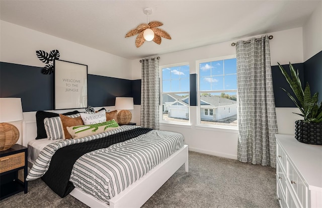 carpeted bedroom with ceiling fan