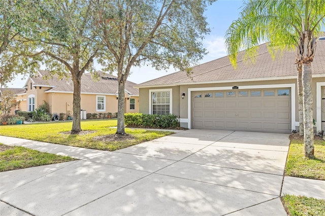 single story home featuring a front yard and a garage