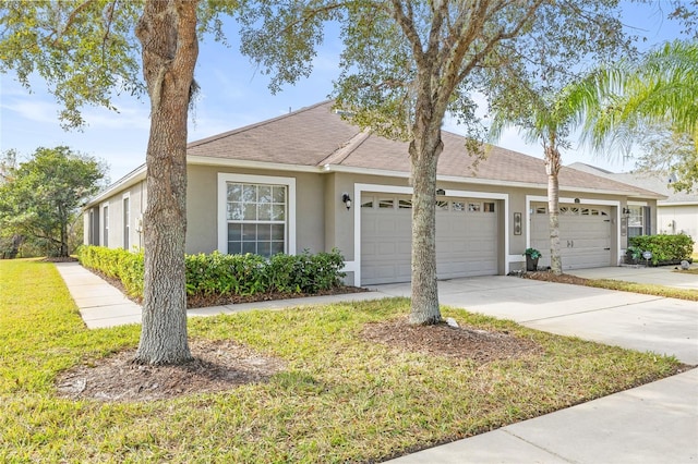 single story home featuring a garage