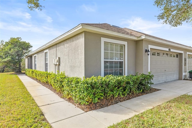 view of property exterior with a garage