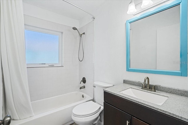 full bathroom with toilet, vanity, and shower / bath combo with shower curtain