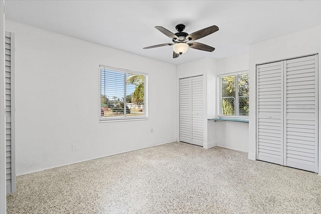 unfurnished bedroom with ceiling fan