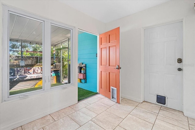 interior space featuring light tile patterned floors