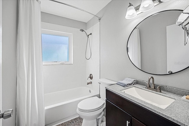 bathroom with shower / bath combination with curtain, toilet, and vanity